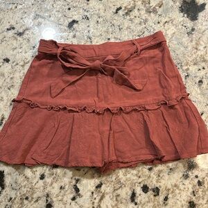 Promesa Skort. Rust color.